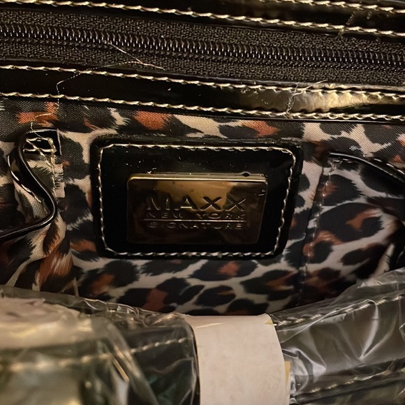 Black brand new MAXX NEW YORK purse. Never used no rips, tears or damage. 14 x 7 - Picture 11 of 11